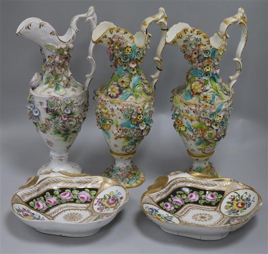 A set of three Coalbrookdale ewers and a pair of dishes
